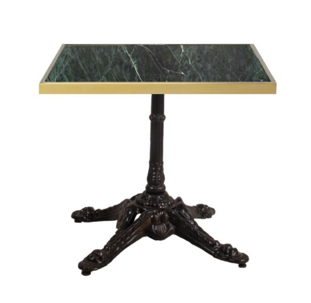 mesa de mármol verde con el canto color oro